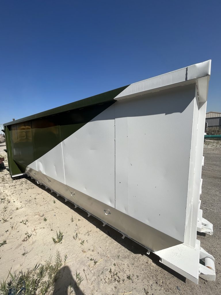Dump trailer green front, white side